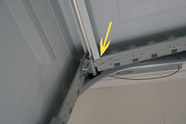 missing hardware on garage door found on this home during a Charleston home inspection.